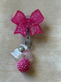 Bow badge reel swivel clip pink with beads