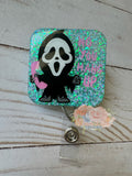 Scream Face phone aqua badge reel