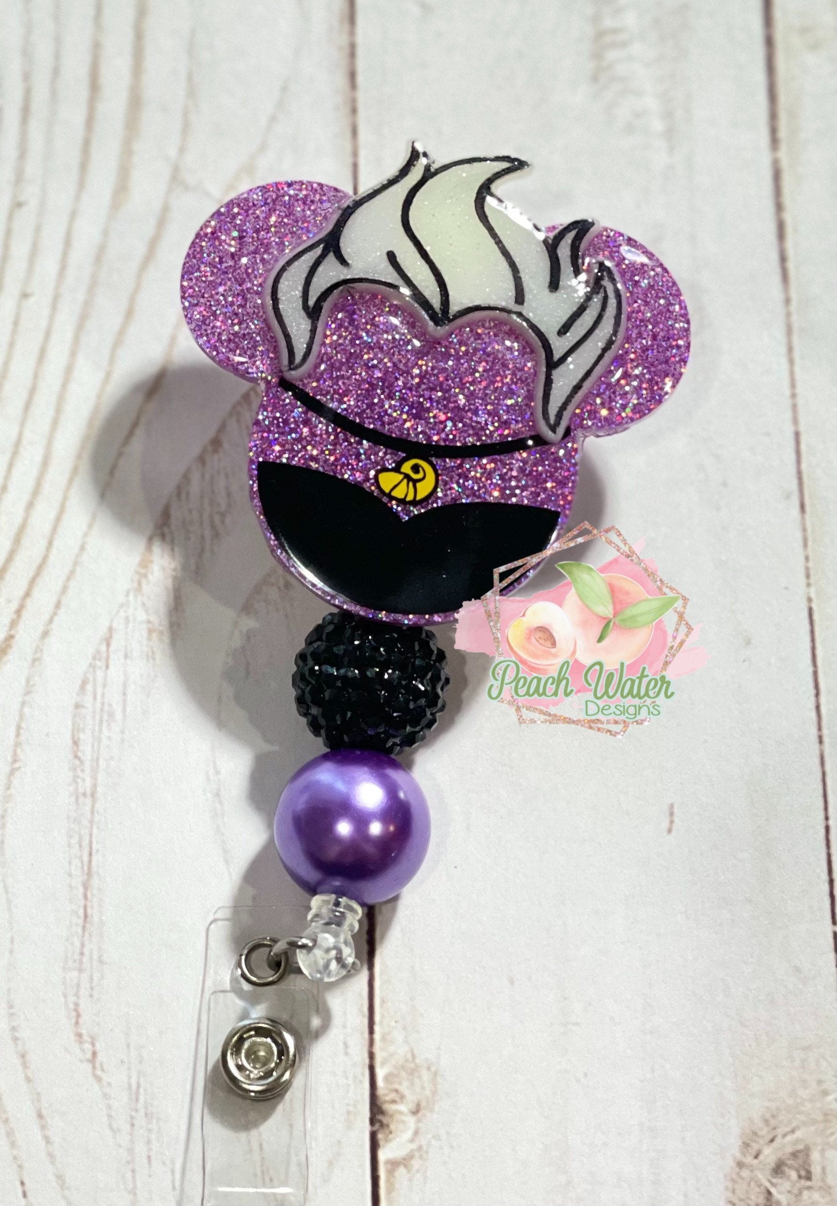 Ursula mermaid under the sea badge reel
